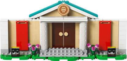 LEGO building set featuring a detailed museum facade with colorful flowers and entrance steps