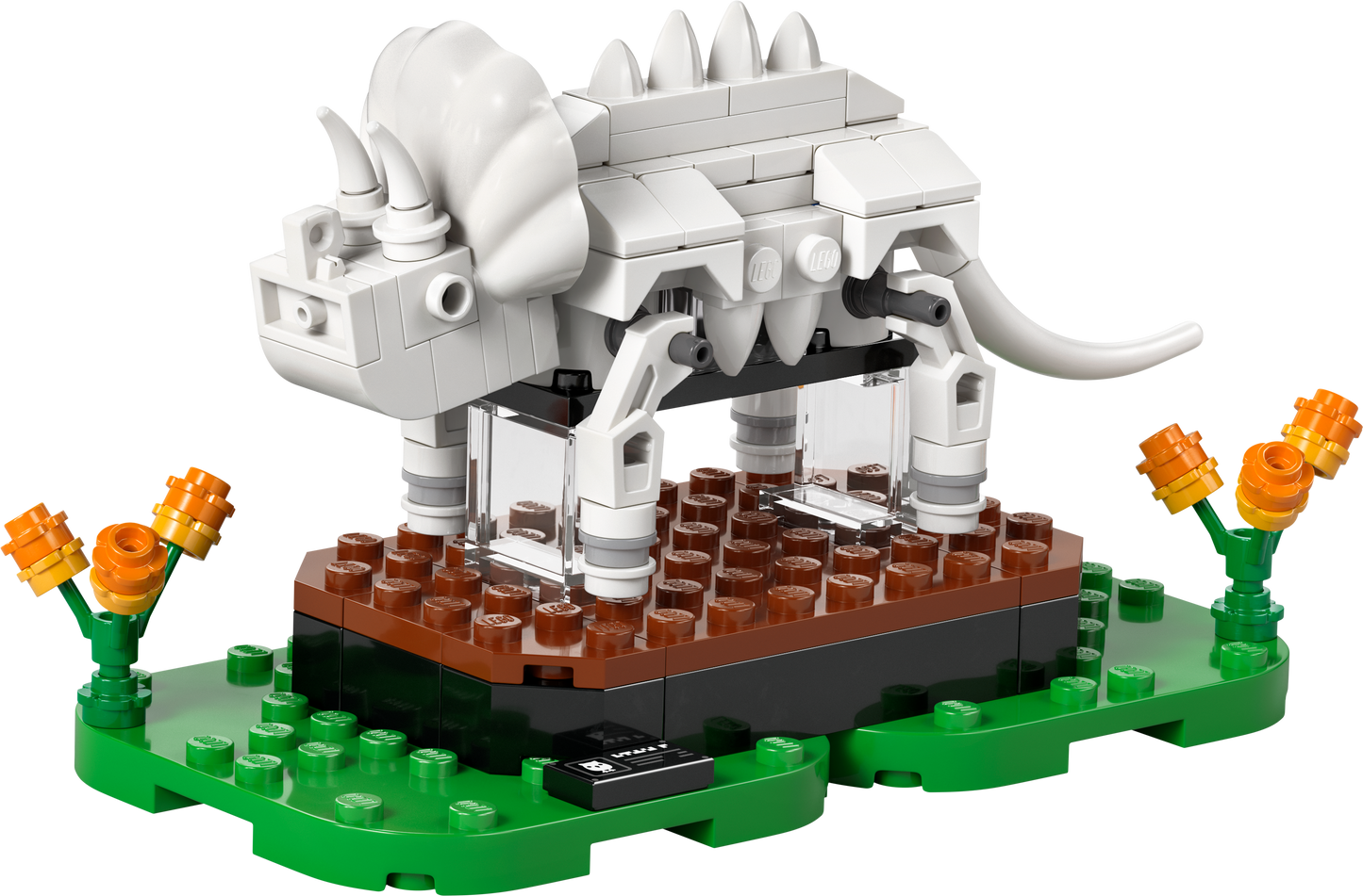 LEGO Triceratops Model on a Display Base with Colorful Flowers and Grass Elements