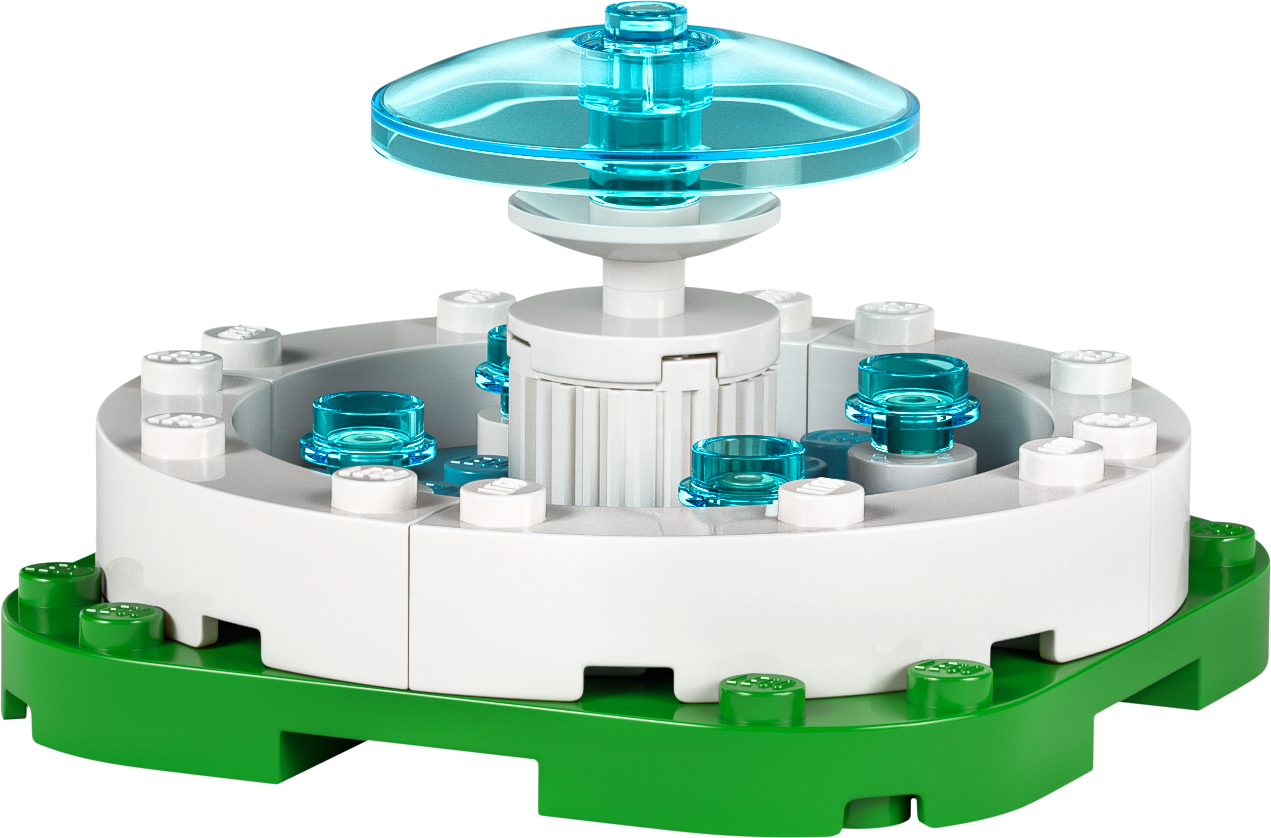 Colorful LEGO build featuring a fountain design with transparent blue pieces on a green base