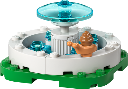 LEGO fountain building set with a teal water feature and a cute snail figure on green base