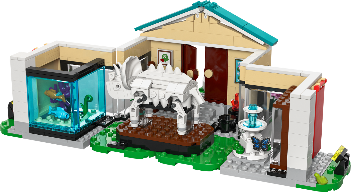 LEGO dinosaur museum set featuring a triceratops model, aquarium, and butterfly display