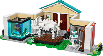 LEGO dinosaur museum set featuring a triceratops model, aquarium, and butterfly display
