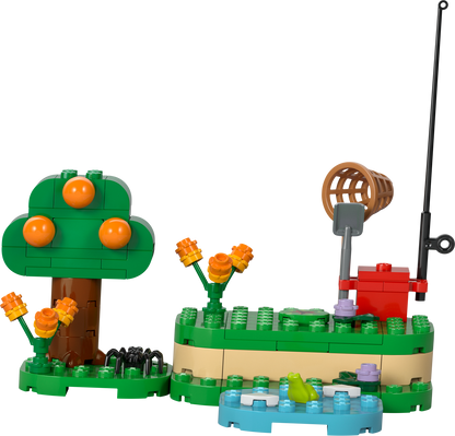 Colorful LEGO fishing scene with a tree, flowers, and a pond for creative building play