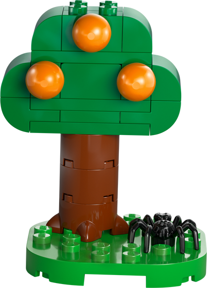 LEGO tree model with orange fruits and a spider figure for creative building fun