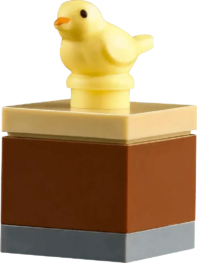 Cute yellow bird figure on a brown and tan LEGO piece for the LEGO botanical garden set