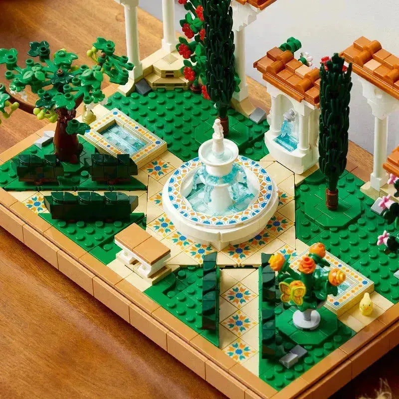 Lego botanical garden set featuring a fountain, trees, and decorative plants for creative building fun