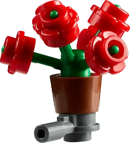 Lego botanical garden build featuring vibrant red flower pieces in a brown pot