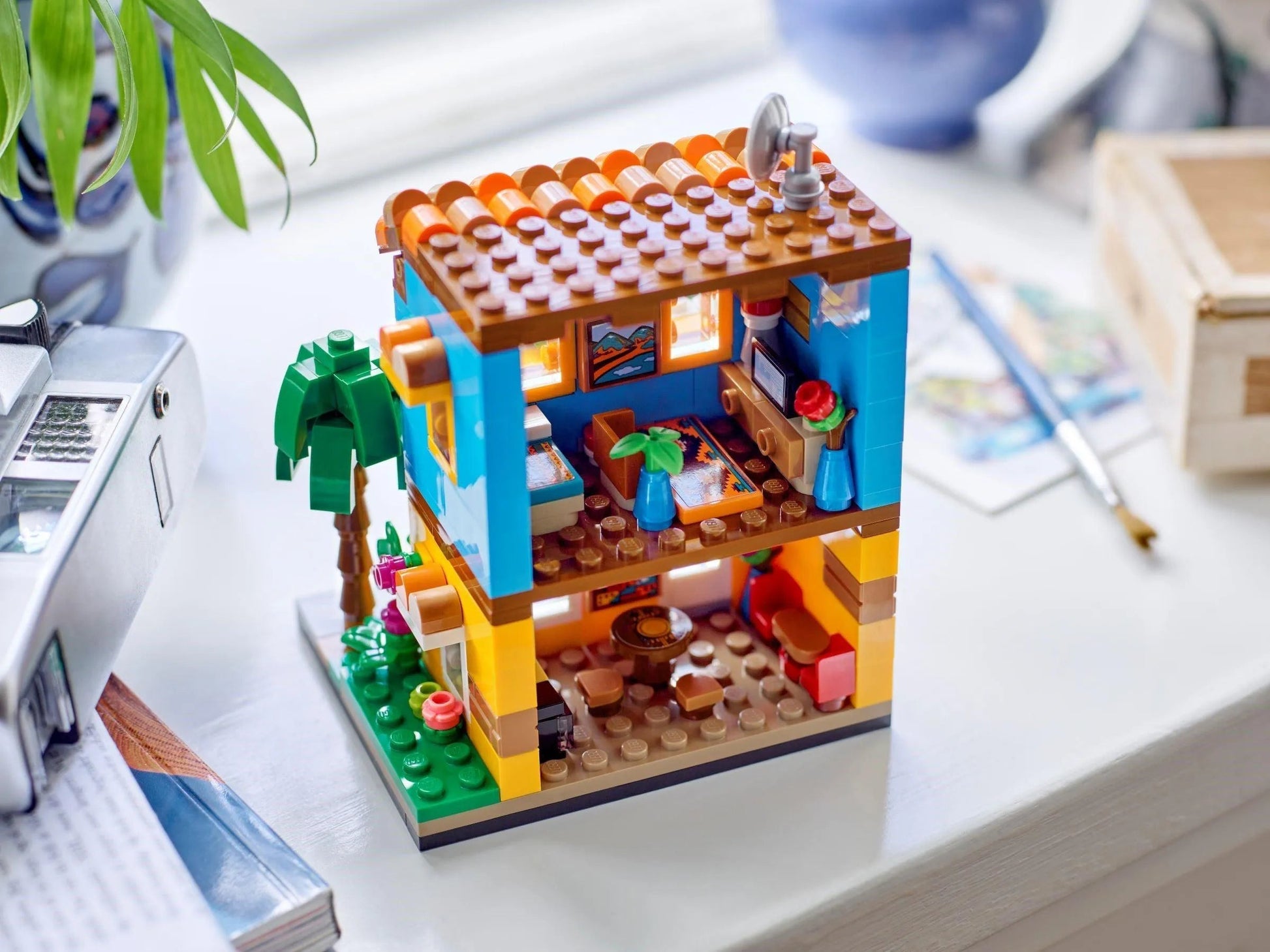 Colorful LEGO house model showcasing a cozy interior, great for fans searching for waffle houses close to me